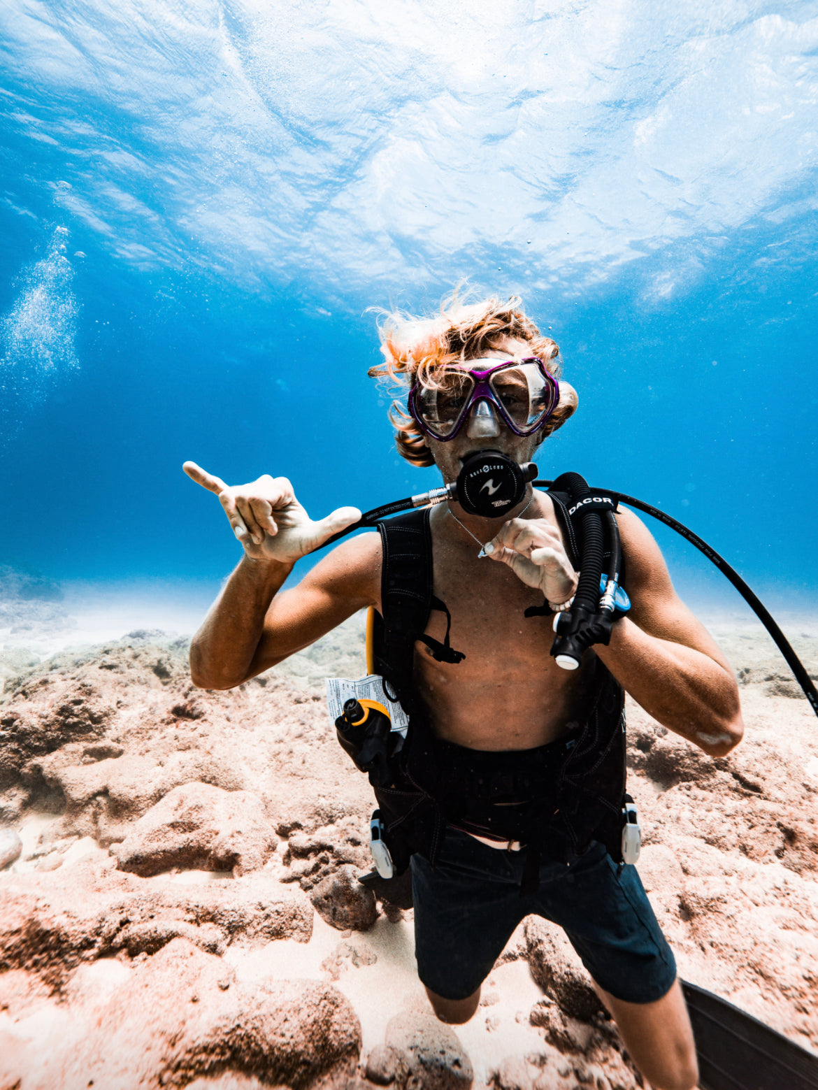 Scuba diving with good vibe jewelry the shaka necklace. Perfect jewelry above and under the ocean.